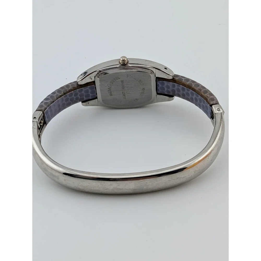 Q&Q Watch Women 20mm Silver Case Purple‎ Leather Bangle Band- New Battery